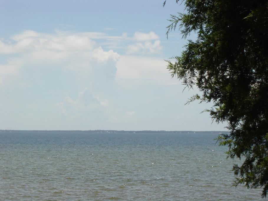 Excellent Waterfront 3 Bedroom 2 Bath All Brick Home .. with a open floorplan and Great views across the Bay towards Sandestin .. High in elevation ..Tile Floors in Foyer, Kitchen, Breakfast area, and Great Room. Corner Fireplace .. Wood laminate flooring in Bedrooms.