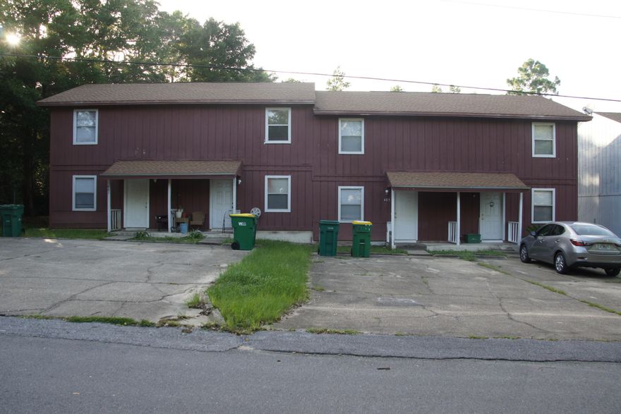 This investment has 4 town homes (2 duplexes). Currently all units are rented. Managed by a rental company. Each unit is 1035 sq. ft. with 2 bedrooms upstairs with a full bathroom and living, dining, kitchen, utility rooms plus half bath downstairs. Roof has dimensional shingles. Seller has approval from city to hook to sewage. No confirmed date. They are also available for sale separately. There is an additional Building of 4 units available. There are 2 tax ID#'s for all for units.