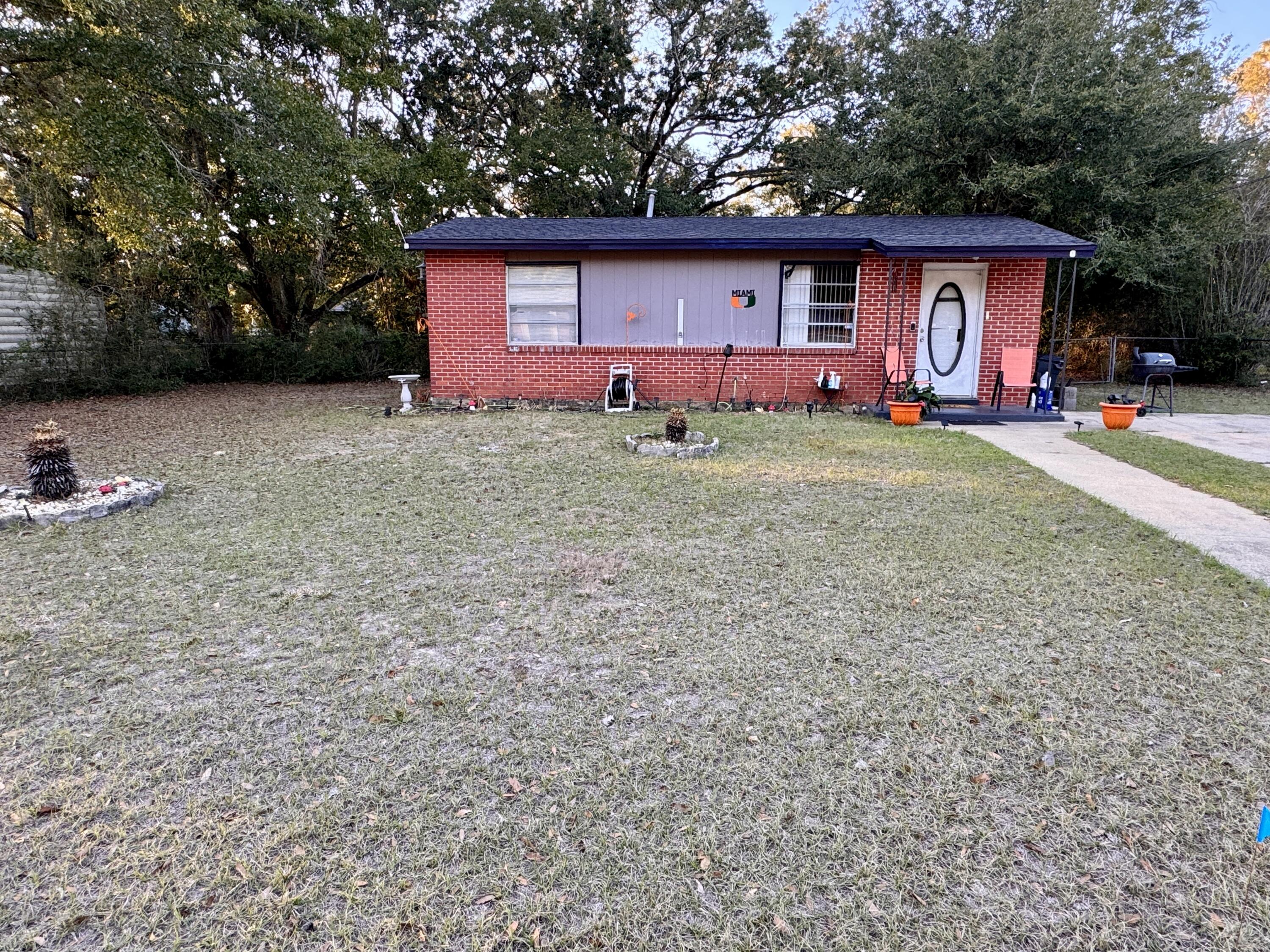 Discover the charm of this classic 1968 brick home! With 825 square feet of cozy living space, this delightful property features a solid structure and character that simply can't be found in newer builds. A major highlight is the recent roof replacement in 2021, offering peace of mind for years to come and the like new shop in the back yard. Embrace the incredible potential of this home, offering a blank canvas ready for your personal touch. Imagine transforming this residence into a reflection of your unique style and preferences. With endless possibilities for customization, you'll have the opportunity to create your dream home, filled with warmth and character. The home presents a fantastic chance to shape the space to your exact desires. Don't miss out on this opportunity - act quickly to make this charming property yours and start crafting your perfect haven today!