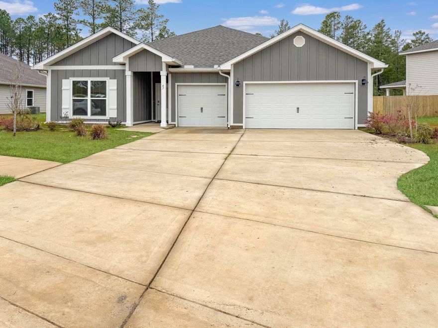 Welcome to Ashton Park! This spacious Camden plan features an open dining area, a large study, four bedrooms, and an extra garage for a third car or golf cart. EVP flooring runs throughout, leading to two front bedrooms with a shared bath, double sink vanity, and shower/tub combo. Trey ceilings add elegance to the dining room, living area, study, and main suite, which boasts a garden tub, separate shower, and spacious walk-in closet. The kitchen is a chef's dream with a center island, ample cabinetry, corner pantry, and stainless-steel appliances, including a smooth-top range, microwave, refrigerator, and dishwasher.