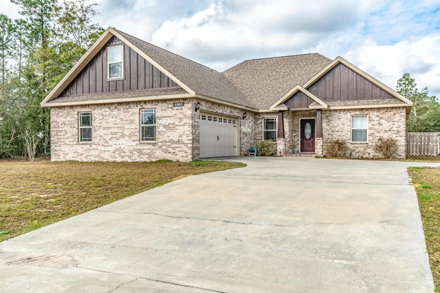 Well maintained beautiful home located in Bridle Wood Estates on half acre fenced lot. The home features an open floor plan with high ceilings, crown molding, recessed light throughout and a wood look plank tile on all areas but the bedrooms. The kitchen is open to the dining area and features granite counters as well as stainless steel appliances and a step up breakfast bar. The Great Room is truly that with tiled floor, crown molding and high ceilings also. The split bedroom plan has 2 bedrooms and bath on one side of the homes and the Master Bedroom Suite on the other. The Master bedroom is large and has a master bathroom with double sink vanity, separate soaking tub and tiled shower and large walk in closet. Upstairs is an oversize room perfect for man cave or additional bedroom.