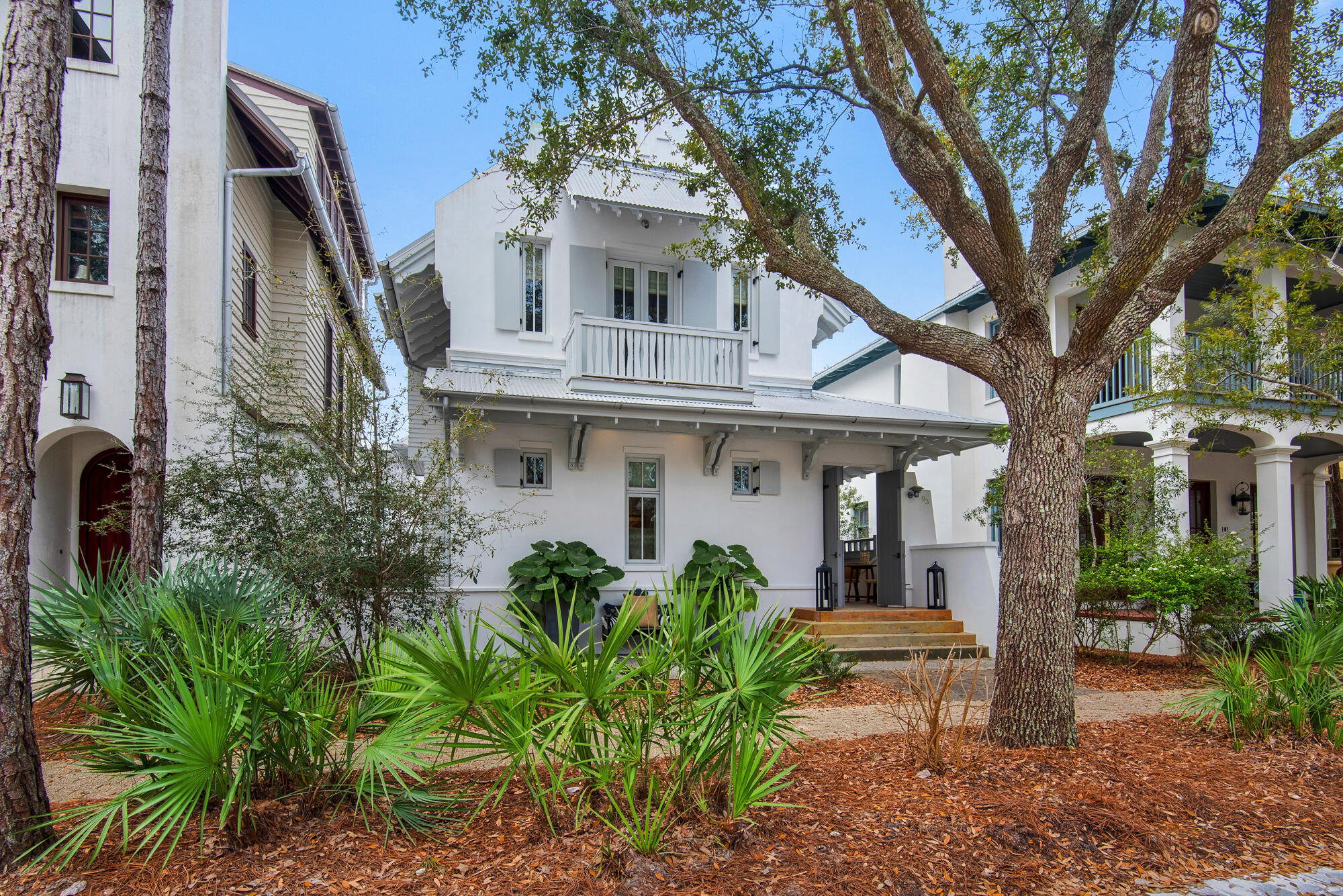 This extravagant Rosemary Beach home goes beyond expectations to deliver a magnificent main cottage and carriage house that could rent separately when not in use. Recent designer updates and renovations have resulted in a luxury home of character that's move-in ready. Broad steps invite you inside where white shiplap walls , soaring vaulted ceilings, exposed iron structural elements and wood beams provide a contemporary living space with a playful ambiance. The Italian-inspired kitchen has a new dual fuel ILVE gas range, 2-tone custom cabinets and custom plaster hood, creating a gourmet kitchen to inspire any keen cook or entertainer. A beverage center and wine chiller ensure that hot and cold drinks are always ready to serve at the pristine island bar. The family-friendly floor plan