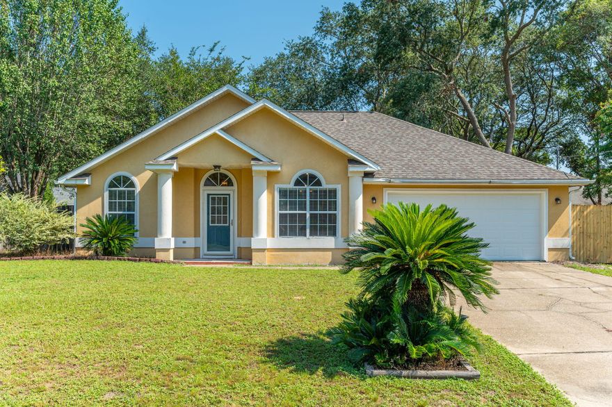 Stunning home with no carpet and huge fully fenced backyard! As you step inside the home you will love the wood laminate flooring, vaulted ceilings, and open floor plan. The kitchen is a dream with stainless steel appliances to include fridge, dishwasher, glass top stove/oven, and microwave. Trendy cabinet coloring with glass view cabinets, breakfast bar, eat in area, pantry, vaulting ceiling and more to finish the space off. Split bedroom floor plan for privacy with the master bedroom featuring an in suite bathroom and large master closet. Bedroom 2 has a vaulted ceiling, bedroom 2 & 3 boast laminate wood floors. The outside space is extensive with a covered porch, outdoor gazebo, storage shed, fenced yard, and expansive grass space. Two car garage, washer/dryer, and cul de sac location!