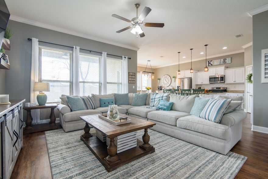 **Better than New!** Welcome home to the Bermuda Bay! Like new construction but without the 6-9 month wait! This open split bedroom floorplan includes a flex room that can be used as an office, playroom or den, plus Family room and Dining room! Home has been meticulously kept in pristine condition. Features include Full brick exterior, over sized 3 car garage, 10' ceilings, Luxury Vinyl Plank flooring, granite counters, Stainless appliances & spacious Kitchen Island - perfect for entertaining! LARGE master suite! Master Bath features His and Her closets, cultured marble double vanity, a soaker tub, and separate shower.  Jack & Jill bathroom, Lanai, Nice size back yard w/ privacy fence & gutters!