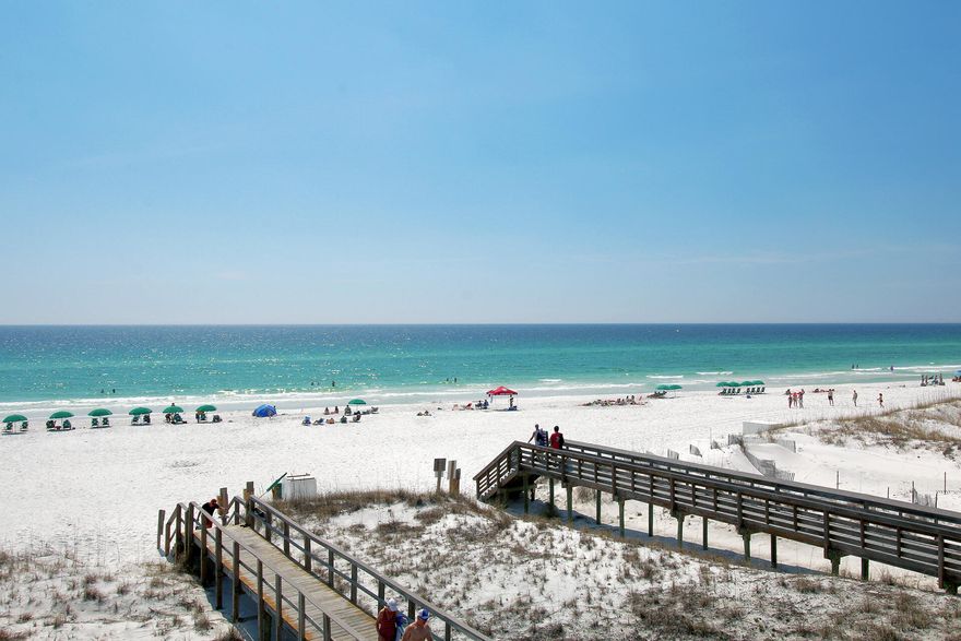 Amazing Gulf Views from this 2BR/2BA, 1,208 Sq Ft unit.  Located in the closest building to the Gulf, at Mainsail, and only one unit back from the front, you will feel like there is nothing between you and the Gulf.  Fully furnished & rental ready, this unit as many upgrades.  Tile floors throughout, smooth ceiling, & granite countertops in the kitchen & baths.  Mainsail amenities include two large pools, tennis courts, covered parking, arcade, 24Hr Security, & 700 feet of deeded beach.