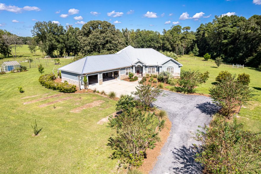 Attention  nature lovers & outdoor enthusiasts who have dreamed of owning a farm in North Walton County Fl.  Look no more.  This is a must see 35 acre farm.  The property includes a ''one of a kind'' 2017 custom built home with 3 bedrooms, 2.5 baths, two separate offices and an oversized three car attached garage. High end appliances include a gas grill top stove.  A gas fireplace serves the great room and one of the offices   The original farm house was built in 1943 makes a great guest house. 9 ac. is in pasture, fenced and cross fenced. Must see the English cottage style garden & the 650 ft. raised wood walking path that runs through 18 wooded acres along the creek.  Out buildings include  barn w/ attached corral & a wood shop with artist alcove. Shown by  appt. 24 hours  notice  requir