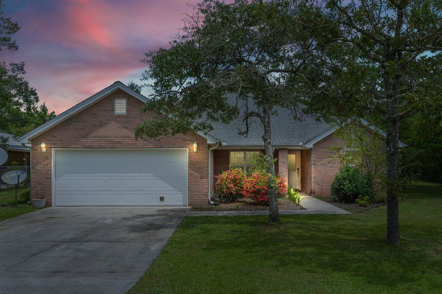 Home has a 72hr kickout clause in effect! Stop the car and look no farther. This meticulous maintained brick home is a must see. Your new home features a ton of custom touches that you will not find in your typical cookie cutter spec home. To name a few you have solid hickory cabinets in the kitchen and bathrooms, tray ceilings with crown molding in the living room and master, vaulted ceiling in the front bedroom, large closets in all rooms, and a beautiful fire place to name a few. Outside you will be just as impress with the large fenced in yard that is perfect for the kids and pets to roam and play, a nice covered back porch for relaxing after a long day at work, rv hook up, and a massive workshop that offers endless possibilities measuring 44'x36' under roof including the lean-to area.