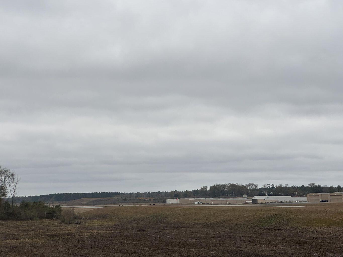 Dream Location for Hunters Paradise either way you won't want to miss this opportunity! This Beautiful 59 +/- Acres of prime land across from the Tri County Airport. Holmes creek runs through a portion of this property. This property is part Holmes county and Jackson county. Bring your air planes, hunting gear, Horses, and ATVS LOCATION LOCATION!!!! This Property has Easy Access to Panama City Beaches I-10, Hwy 162, Hwy 173, and Hwy 90