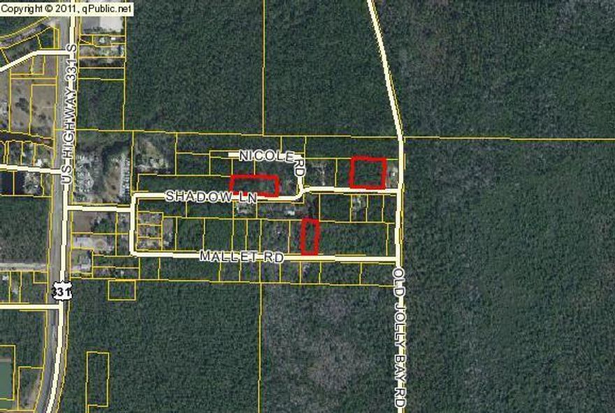 Building lot on the quiet side of the Bay. Convenient location. Close to Publix, Hwy 331, and minutes to the Bay and Beach. Possible wetlands may require DEP Permit before county will issue building permits.