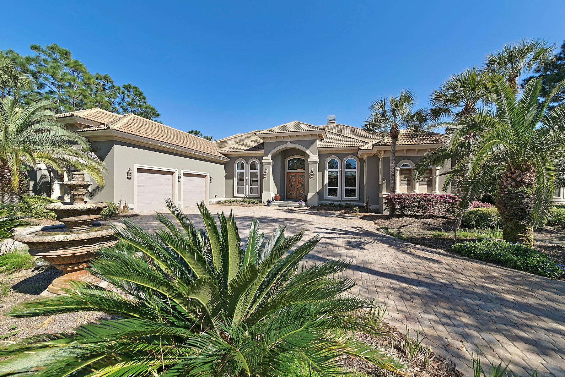 Behind the gates of Burnt Pine at Sandestin Golf and Beach Resorts sitsone of the most exquisite homes you will find in this exclusive, highly sought after neighborhood. Perfectly situated on a large lot on Burnt Pine Lane, this freshly painted with soothing neutral colors, one owner executive home, custom built by Boswell Builders, offers gorgeous views across the lake to the 14th hole of the Raven Golf Course. From the moment you enter the foyer, you can't help but be impressed with the attention to detail find throughout the open layout of this distinctively luxurious residence. Whether you are a seasoned chef or weekend bar-b-que master, you will love entertaining with the spectacular gourmet kitchen, multiple fireplaces and expansive outdoor living spaces.