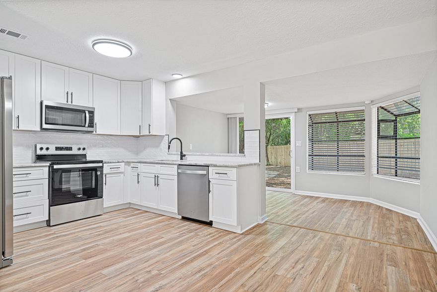 Welcome to 7653 East Bay Blvd., Navarre - A Rare Find on 1.2 Acres!This beautifully updated 3-bedroom, 2-bath home offers 1,600 square feet of comfortable living space. Nestled on a spacious 1.2-acre lot, this property is a true gem!Home Features:&#10004; Newly Updated Kitchen - Stainless steel appliances, stunning granite countertops, and modern cabinetry&#10004; Fresh Flooring Throughout - Laminate in main areas, luxury vinyl in baths, and cozy carpet in bedrooms&#10004; Recently Painted Inside & Out - A fresh, modern look throughout the entire home&#10004; Upgraded Baths - New vanities, mirrors, lighting, and fixtures&#10004; New Interior Doors - Adding a touch of style and functionality. 2016 roof, 2023 ac, 2025 hot water heater, 2025 septic installation in progress