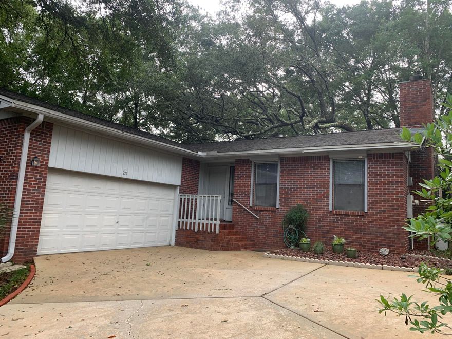 All BRICK 3 bedroom, 2 bath home set back among the trees at the end of a CUL-DE-SAC. This Joel Barton built home offers an abundance of natural light throughout, a spacious living room with vaulted ceilings and a cozy wood burning fireplace. Laminate wood look flooring throughout main areas and 2 of 3 bedrooms!The kitchen has plenty of counterspace for meal prep, and adequate cabinetry for storage. The large backyard offers a SCREENED-IN PORCH, and surrounded by mature trees.This home comes complete with a courtyard style 2-car garage.HVAC-2018. Roof- 2006.Custom roll down HURRICANE SHUTTERS in place.Don't miss the opportunity to make this home yours- located in the heart of Niceville with convenient access to top-rated schools, shopping, and beautiful white sand beaches in Destin.