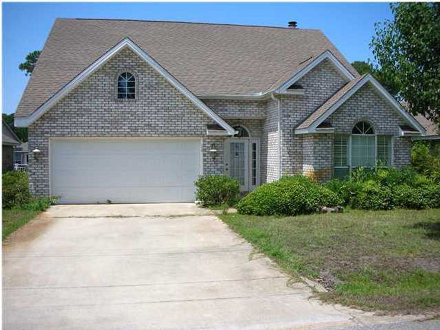 Wonderful 3 bedroom home on the lake! All ceramic tile in living areas, great open floor plan. This home is in the heart of Destin/Miramar Beach close to shopping, beach and restaurants.