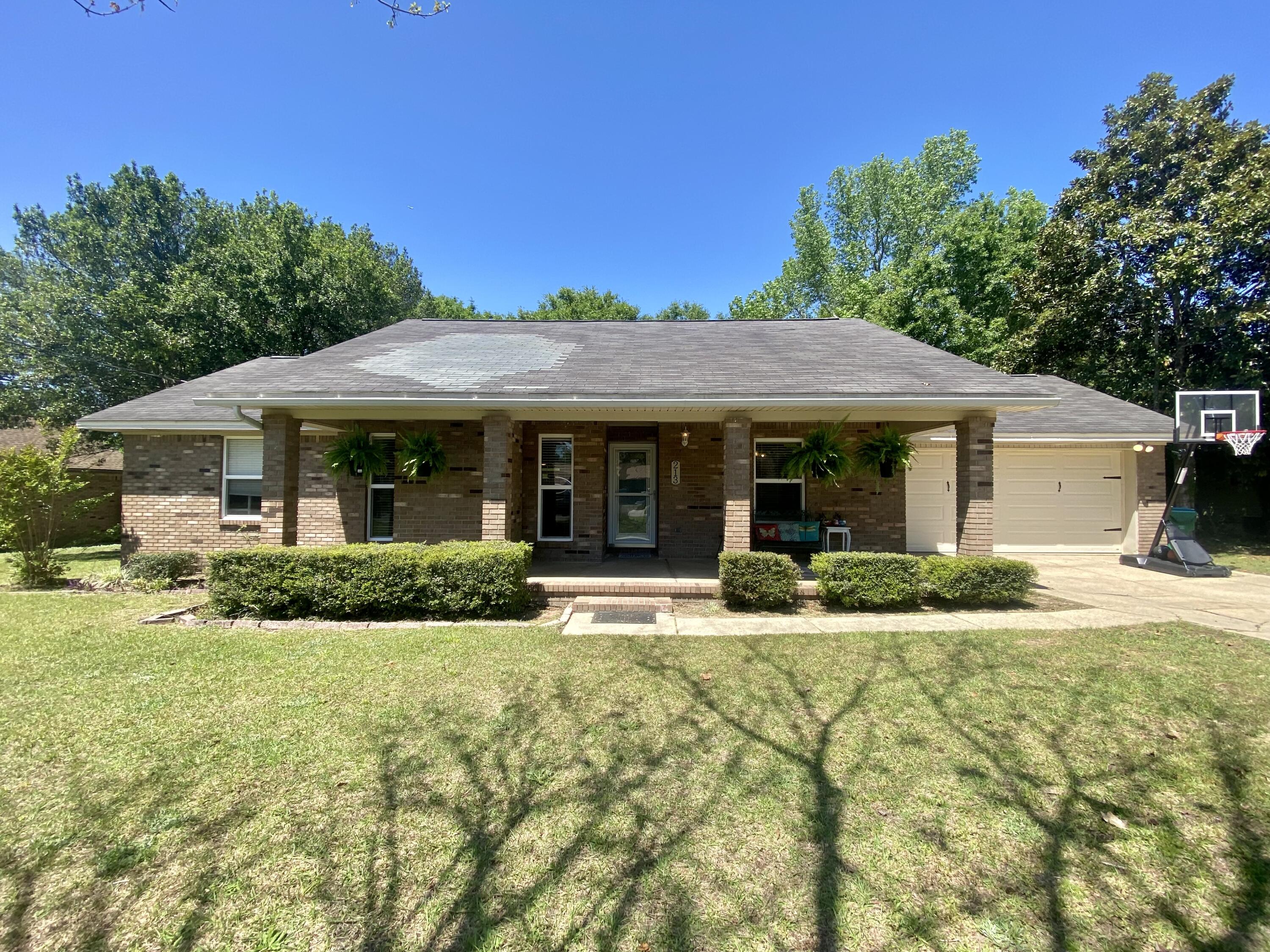 **A BRAND NEW ROOF will be put on prior to closing!** This adorable 3 bedroom/2 bath home is ready for it's new owners! This home features a split floorpan with the master being on one side of the home, and the two additional bedrooms on the other side. The kitchen is completely updated with beautiful cabinetry, huge pull-out drawers, and newer stainless steel appliances. You'll love the wainscoting in the laundry room just off of the kitchen as well! This home also features an enclosed florida room which would make an amazing office space, or room for the pets! Both the front entry and backdoor are large covered areas, and the backyard is absolutely perfect for entertaining! You don't want to miss out on seeing this home!