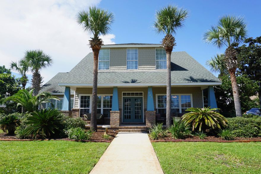 Literally steps to and views of the Santa Rosa Sound with a beach and picnic area. Unobstructed views of the water. This immaculate, well maintained, home has never been rented and used as a 2nd home for 10 years. The first level has a formal front living room and dining room, den with fireplace, open floorplan kitchen with breakfast area and the master bedroom ensuite. His/Hers closets in master bedroom/bathroom, and double headed shower, private commode. Refrigerator/washer/dryer remain. The upstairs features 2 bedrooms, a landing area perfect for an office or reading and additional room that is being used as a 4th bedroom. Home sits in a cul-de-sac on a large lot. Perfectly positioned for a pool to be added which could have water views. 2 car garage, beautiful landscaping. Other features include: crown molding, cherry color cabinets in kitchen, kitchen island, granite in kitchen, laundry area next to master bedroom, tiled flooring, side entry garage.  Homeowner put in brick paver patio, landscaping, new Hot Water Heater in April 2018, Irrigation well pump in March 2017,  painted interior rooms and new water faucets in master bathroom and kitchen.