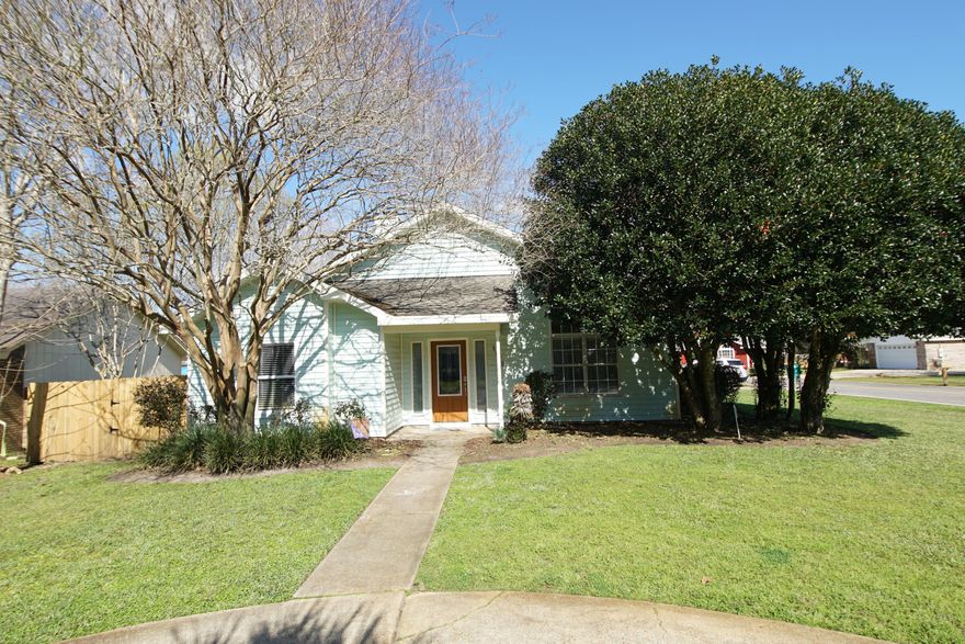 Charming home in the heart of Destin! This VA approved residence has been updated with features that include: vaulted ceilings, built in shelving, fireplace with stone tiled surround, updated light fixtures, and wood-style tiled flooring throughout the main living areas. The master bath boasts glass vessel double vanities, whirlpool tub, beautiful tiled shower and built in blue tooth speakers. The kitchen has gorgeous quartz countertops, stone tiled kickboard and backsplash, stainless steel stove and dishwasher and two pantries. There is an additional large bonus room with attic space for storage and would be perfect for an office, play room or entertainment area! A new roof was placed in 2017. The HVAC system was replaced in 2019. 
 The home sits on a large corner lot while the backyard has a storage shed, privacy fence and two decks for relaxing and enjoying the outdoors! Don't let this one pass you by!