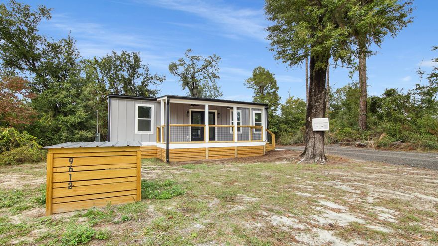 NEW! NEW! NEW! ***USDA eligible*** zero down payment will get you into this beautiful new construction on a quiet street with lake access. The lake is only one block from the home with three boat ramps less than a half mile away.  It has a covered front porch making up 160 square feet, new windows, new doors, all utilities, LED fireplace for those cool nights, Full size laundry hookups available. EVERYTHING NEW! Make this your new home today. Only 30 minutes to the beach and 15 minutes to downtown shopping and restaurants. Seller offering a concession of $2,000 toward new sod or closing costs.