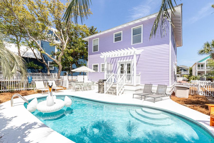 South of 30a, and just steps away from the white sandy beach, ''Rainbow Fish'' has charmed repeat guests year after year. Situated on the largest lot in gated Sunrise Beach, you'll love the privacy that the mature landscaping provides. The lot leaves room for a potential addition or garage and carriage house!  Enjoy the private heated pool out back and Gulf views from the second floor! There are hardwood floors in the main living areas and throughout the bedrooms upstairs. Directly at the end of the street, only 60 yds from the house, you'll find 1 of 2 neighborhood beach walkovers. The Gulf front community has over 500ft of neighborhood beach with seasonal beach service, and is conveniently located just a quick walk away from Shunk Gulley and all the dining and entertainment at Gulf Place