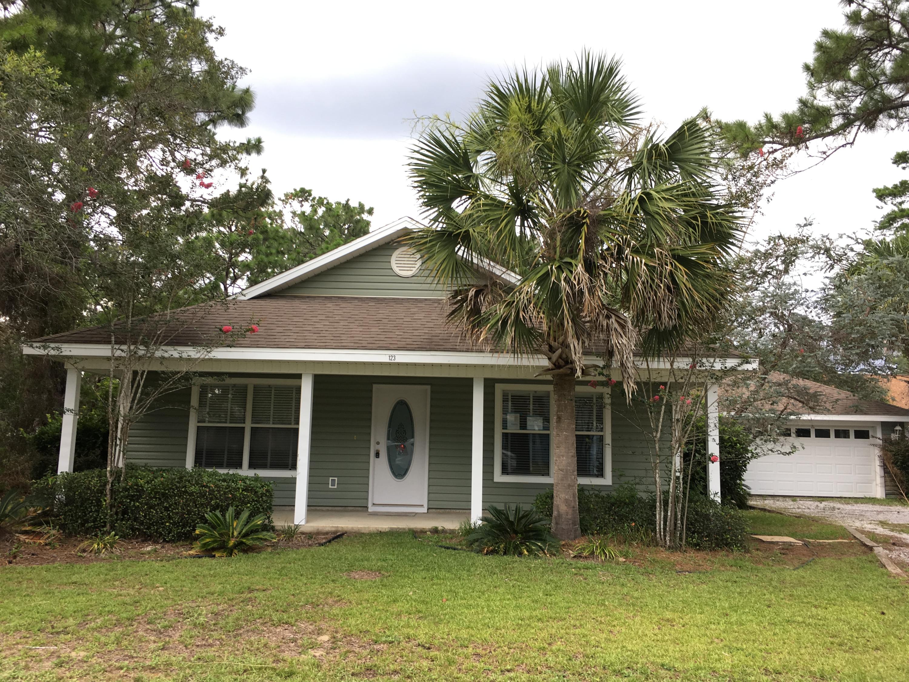 REO Come see this lovely 3 bedroom 2 bath Florida Cottage with a detached 2 car garage on a quiet street in Santa Rosa Beach. You will just love the floor plan in this spacious and inviting home. The home has just been updated with freshl paint, new carpet, and brand new stainless steel appliances. It is beautiful and is ready to be called HOME!! The home has a split floor plan with the 2 spare bedrooms and bath on the right side of the home and the master suite on the left. There is also a large detached 2 car garage, covered front and back porches, & a spacious fenced back yard. It is in a great location, situated just minutes from the beaches, restaurants, schools, shopping, hospital & more! The only thing missing is YOU!!