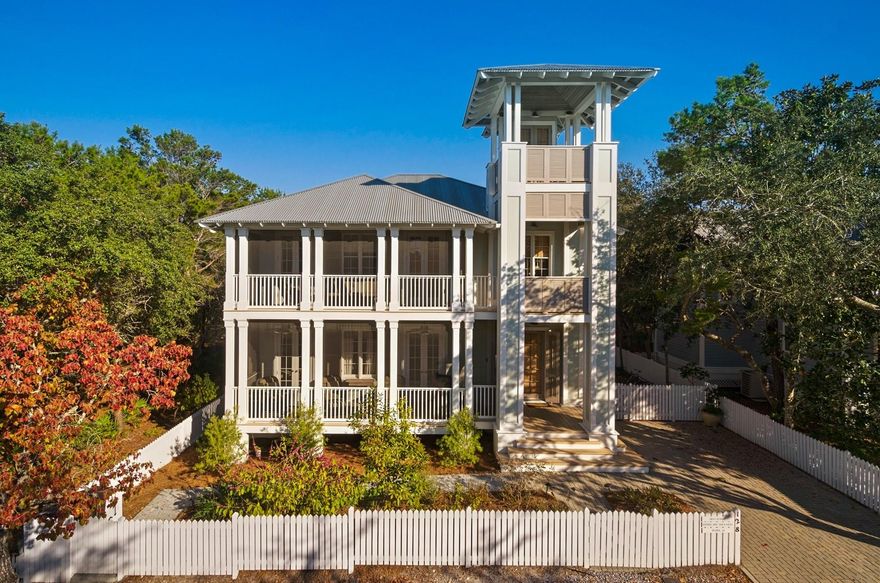 Nestled in the heart of Seaside, this beach home was built to encompass the refined style of one of 30A's original beachside communities.Upon arriving at Sweet Retreat'' you are welcomed by three stories of outdoor entertaining spaces, along with patios and decking to connect the main house to the fully serviced guest house. Through the generous front foyer, walk into the inviting living and dining room, dressed in a combination of modern and antique furnishings. Doric columns define each of the main areas on the first floor, but offer visibility from every room into the next. The Kitchen is equipped with everything a cook might need and is tucked away with pocket doors to allow entertainment to remain in the large indoor / outdoor living and dining spaces.