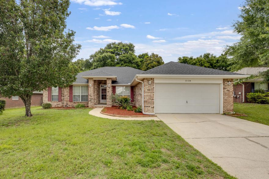 Welcome to 2124 Hagood Loop, a lovingly cared-for one-owner home located in a desirable community. This charming property offers peace of mind with some major updates already done. But it's also ready for a new family's personal touches. Roof was replaced last month offering cheaper insurance rates and years of worry-free living. The water heater is brand new. and the HVAC is around 5 years old.  The HOA dues in this community remain extremely low but offer amenities like a park and beautiful community spaces. This spacious layout offers a split floor plan with 4 bedrooms, two baths and two flex spaces currently being used as a dining room and office. The screened in back porch gives you to opportunity to expand your living space even further.  The vaulted ceilings, corner fireplace, eat-in kitchen with breakfast bar and two car garage checks all the boxes and makes this home one you can love for a long time.  With all of the counter space and cabinets offered in this kitchen you will enjoy preparing meals, hosting gatherings and family dining.  Don't miss this rare opportunity to own a solid home at a great price. Schedule your private showing today.