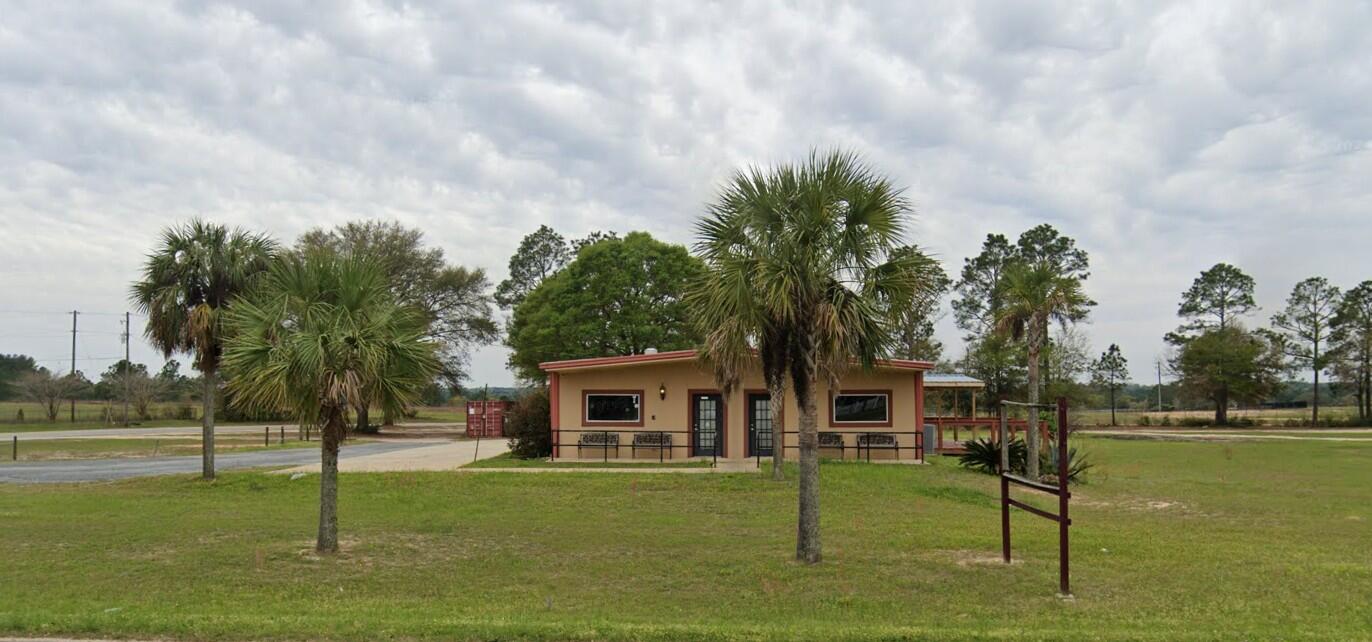 This property offers a unique opportunity for investors and entrepreneurs to tap into the growing commercial landscape of Baker, FL. With its strategic location, the potential for various business models, and the allure of outdoor dining, this site is perfect for anyone looking to make a mark in the local market. Property includes fully equipped kitchen and a seating capacity for approximately 70 people.