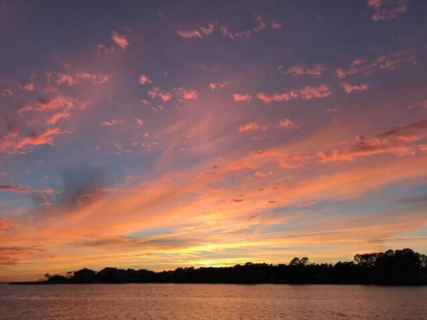 South of 30A and on a Rare Coastal Dune Lake with 150' of frontage on Eastern Lake. Easy access to the county beach via boat, paddle board, etc. or a 5 minute walk. Located between Seaside and Rosemary Beach. This old Florida beach home boasts a large nearly half acre lot with lots of room for a pool or home expansion. Spacious deck with boat dock and ramp.  Abundant windows and sliding glass doors offering extensive views of the water capturing spectacular sunsets. Tile, hardwood floors, granite & rock walls, gas fireplace, large upgraded kitchen with all stainless steel appliances. 2 brand new A/C units including dehumidifiers and air purifier. A partial trade considered. No HOA!  Buyer to verify all.  By appointment only.