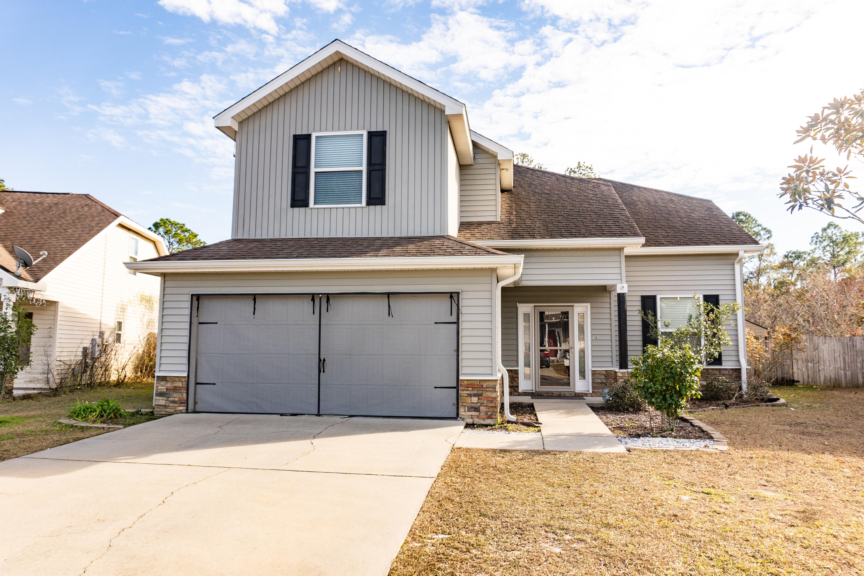 Available 01/27/25......South Crestview home with easy commute to bases, beaches and shopping.  2 Story home featuring an inground pool, 4 bedrooms, 3 bathrooms, office/formal dining space, eat in kitchen, breakfast bar, and large living room with neutral colors.  All of the bedrooms are upstairs with 2 full bathrooms upstairs and a full bathroom downstairs.  Upstairs landing for a small sitting area.  All 4 bedrooms are spacious.  Covered back lanai, yard building, privacy fenced back yard and good size backyard, perfect for outdoor activities and entertaining.  No smoking or vaping in the home.  Pets will be allowed with a $400 non-refundable pet fee. The homeowner will maintain the monthly care of the pool.  This is a must see for location and amenities.