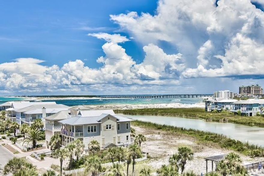 A single 3Br/3Ba Jetty East condominium unit that was built as a side-by-side 2Br/2Ba and 1Br/1Ba duplex. Use one side or the other, as you deem, while the other side is available to others, or you can connect both sides for your use, when you need. The two sides can rent separately, by different guests, or can be rented together by one guest group.  These ''jetty view'' units enjoy a beautiful peaceful westward view over Lake Christina to East Pass. See the fireworks! Jetty East is a well-established Destin beach condo building with a strong following among owners and among long-time repeat rental guests. Come see these two units and then take time to walk out to see the beach pavilion, by the pool. Good sound board w/ good conservative financial management and good building management.