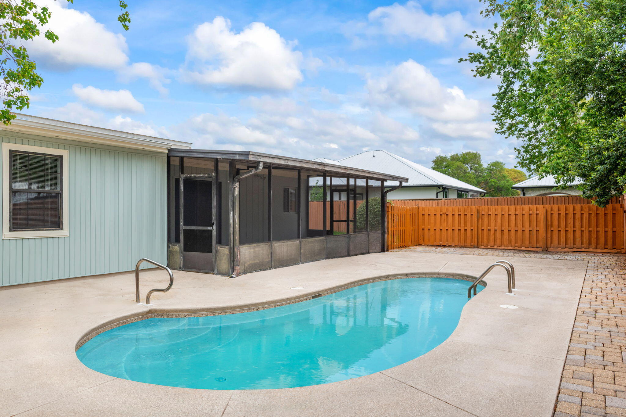 OPEN HOUSE THIS SATURDAY (7/26/25) From 10am-3pm. So stop on by and see this awesome home! Welcome to 240 W Lorraine Drive -- a beautifully maintained 4-bedroom, 2-bathroom home with the perfect size gunite pool in the back yard. It is nestled in the heart of Mary Esther, just minutes from Hurlburt Field, shopping, dining, and the white sandy beaches of the Emerald Coast. This move-in-ready home features a spacious living area, updated flooring, and plenty of natural light throughout. The kitchen offers granite countertops, stainless steel appliances, a breakfast bar, and a cozy dining space. Plenty of bedrooms for a growing family. Step outside to a fully fenced backyard with a large screened in patio which is ideal for weekend BBQs, pets, and pool parties! NO HOA! Text or call the listing agent now to scheduled your personal showing or video tour