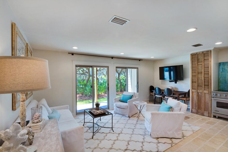 High-end finishes without the mega-house price tag. This beautiful 1 BR, 1 BTH condo was finished with all of the comforts of home. As you walk in the door, you will notice the travertine floors that run throughout the unit and the built-in bunks with their own TVs. The bedroom is large enough for a king bed and has ample closet space for a longer stay. The bath features a new vanity and a huge tile shower. The real star is the main space, with tons of natural light coming in through the two patio doors overlooking the large pool. Hang out in comfort as your group's chef prepares a meal in the custom kitchen complete with limestone counters, under-mount sink, Viking Range, Sub Zero refrigerator and a custom pantry. The County's largest beach access is about 50 feet from your back gate.