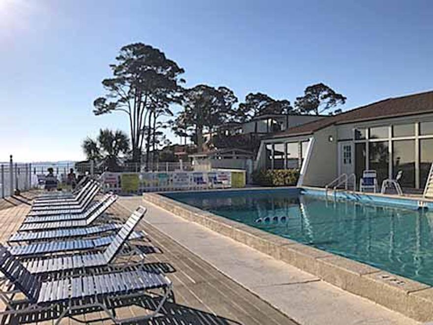 Welcome to ''MI CASA...SEA CASA''. Lovely 1-bedroom, 1-bathroom unit in a waterfront complex on the gorgeous Santa Rosa Sound at a great price! This spacious unit is just steps from the water and has water view from the balcony where one can enjoy quiet evening and the nice and warm breeze from Intracoastal Waterway or perhaps one can take a dip in the well maintained waterfront community pool after a day at the beach. Furnished & Rental/ Move-In Ready!The main features include light color ceramic tile floors throughout, no carpet, white kitchen appliances, newer heating and cooling unit, nice clean wall paint, all new plumbing, a like new sofa sleeper in living room, flat screen TV and a large breakfast bar when you can enjoy many relaxing hours in the company of your loved ones.