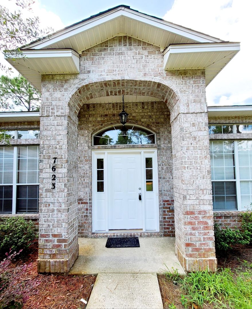 YES! This is the one you have been looking for! Split-bedroom and open living plan is the perfect, creating a great flow from the entry throughout.  An impressive entrance opens into a beautiful foyer, but the first thing you will notice is the gorgeous Concord Maple Spill Repel wood flooring. It will knock your socks off!  The wood flooring is in the living, kitchen/breakfast area, dining room halls, bathrooms and laundry.  Living room is open to breakfast area and kitchen and features a lovely wood-burning fireplace with mantle.  Gather in the kitchen and breakfast area around the island/breakfast bar or entertain in the separate formal dining room.  Retreat to your private bedroom suite and soak your day away in the garden tub or get organized in the huge walk-in closet.