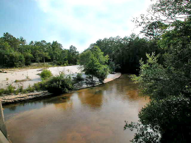 All W OF POND CREEK IN NE 1/4 OF NE 1/4 as db 11-423 & db 40 692 - Land