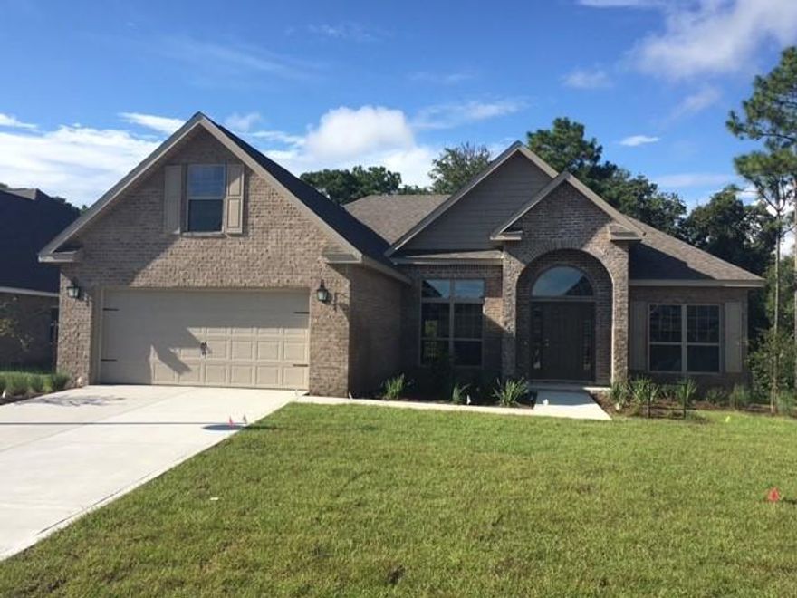 MOVE IN READY! Be the very First homeowner of this beautiful 4-sided brick home! The home site itself is quite unique backing up to preservation in the heart of Santa Rosa Beach. Peach Creek is centrally located to 5 schools, shopping, dining, and the beautiful white sandy beaches of South Walton! The Glen features split floor plan, spacious guest bedrooms with walk-in closets, nice office space and formal dining room. Bonus Room is a great entertainment room, storage or bedroom. Kitchen features breakfast bar and nice counter space with Stainless appliances, Hardwood flooring & light hand painted cabinets. Lawn features irrigation and private well for low maintenance lawn care. Beautiful view of the greenspace behind home for additional privacy.