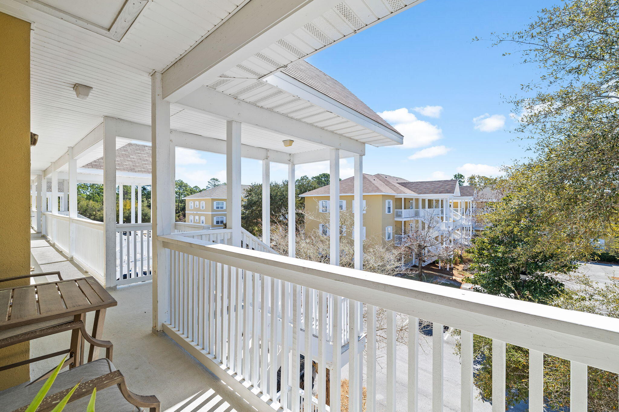 Nestled along the picturesque Scenic Highway 30A, this beautifully updated end-unit condo offers a serene retreat with stunning views of Point Washington State Forest. Perched on the top floor, this light-filled residence boasts modern upgrades and thoughtful design throughout. Step inside to discover luxury vinyl plank flooring that flows seamlessly through the spacious living areas and bedrooms. The stylish kitchen is a chef's delight, featuring quartz countertops, a striking glass tile backsplash, a farmhouse sink, stainless steel appliances, and a custom hood vent. For added convenience, the condo also includes an in-unit laundry, making everyday living effortless. Whether you're seeking a full-time residence or a vacation getaway, this condo provides the perfect blend of comfort ... and convenience in one of 30A's most desirable locations. Don't miss this rare opportunity to own a slice of paradise!