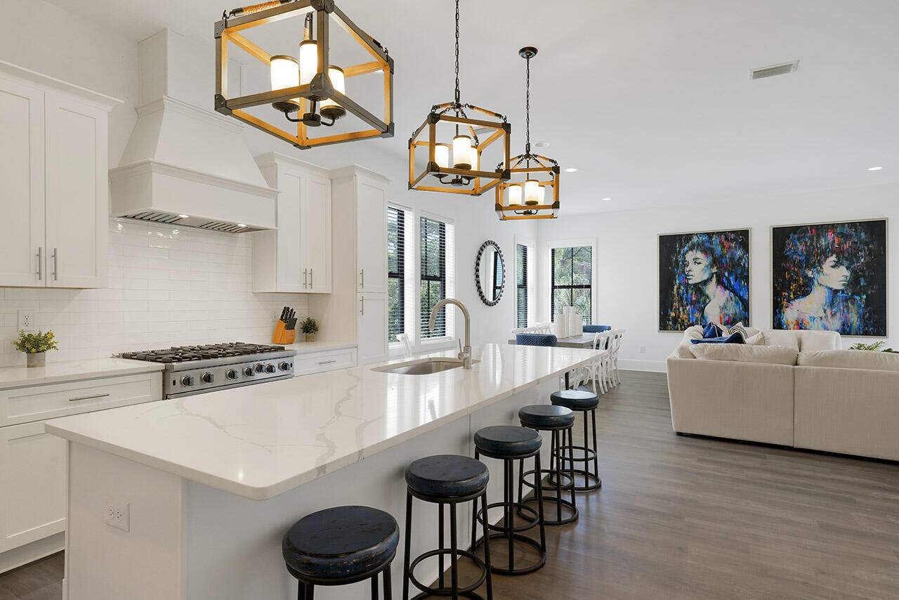 Home now under contract. See listing for identical home at 118 Leisure Lane next door. Brand New Construction and sold beautifully and newly furnished. There's still plenty of time to rent out for spring/summer season. Steps from ultra-happening Shunk Gulley restaurant and 30A's widest public beach access at Ed Walline Park. Located adjacent to Gulf Place entertainment district. Plan on monthly afternoon art walks, Saturday concerts on the lawn, leisurely dinners at renowned restaurants, and memorable shopping. No wonder this ''has it all' home is projected to produce over $220K per year in vacation rental income. This newly built stunner sleeps 14 across 6 bedrooms, has a private pool that can be heated, an elevator that accesses all floors.