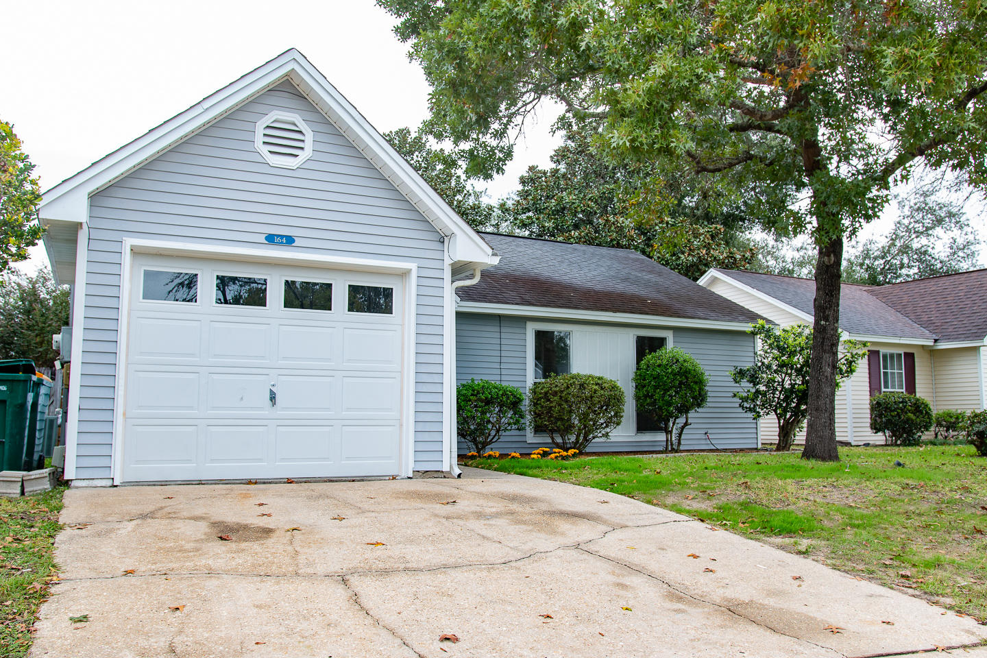 Located in the desired neighborhood of Blue Pine Village this 3/2 home is ready for a new family! The entire interior has been newly painted, new doors including hinges and door knobs, new carpet, new stainless stove/oven, dishwasher, range hood (refrigerator was already in place), new bath vanities, new lighting, new ceiling fans. As you enter the home your enter the living room with a wood burning fireplace, new carpet, and vaulted ceilings. The eat in kitchen is off to the left offering stainless appliances and a herb garden window along with a large windows to enjoy the view of the backyard. The cozy backyard is fully fenced and has a patio to sit and relax. Blue Pine Village has a community pool and a storage lot for boats/trailers etc. Buyer to verify all measurements.