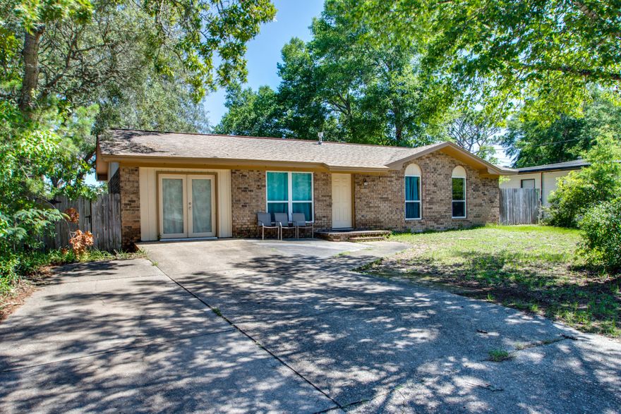 Back on the market at NO FAULT of the sellers!Located minutes from Eglin and across the street from the neighborhood park, you won't find a better location in Valparaiso! Granite countertops and stainless steel appliances can be found in the kitchen along with laminate flooring in the main living areas. The large master bedroom has two closets and the master bathroom has a large walk-in shower and 6ft soaking tub. Large backyard has plenty of space for boat or RV parking, play areas for kids or for entertaining!