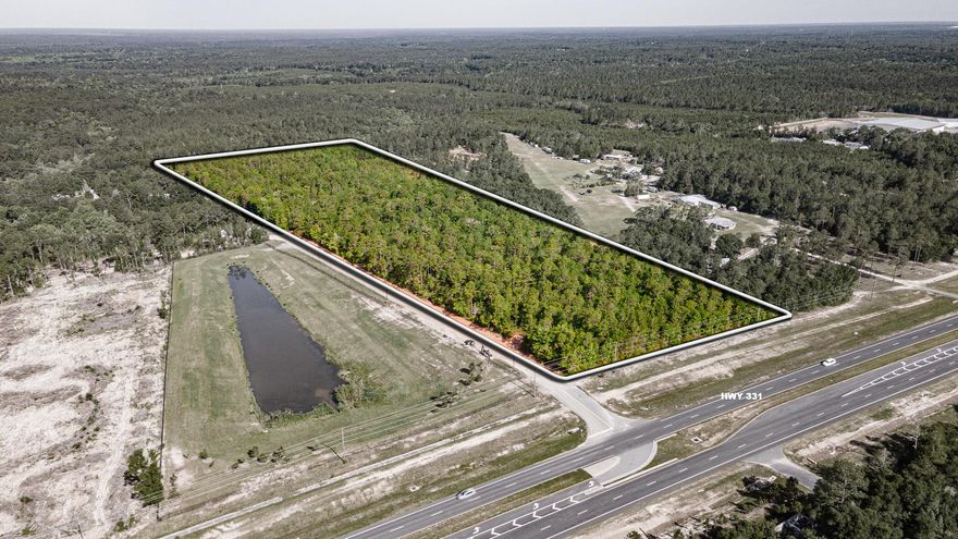 25 acres of prime commercial property with over 400 feet of road frontage strategically located on US Hwy 331 between the booming area of Freeport and Defuniak Springs. Perfect for your commercial venture like hospitality, storage facilities and complimentary businesses near the NW Florida Commerce park just 2,000 feet north. Within 3.6 miles of the junction of I-10 and US Hwy 331, the main east/west and north/south highway corridor in Walton County. Surrounded by active residential developments with thousand's of single-family homes by the nation's largest home builders. Traffic count of 22982 per day. Existing commercial parcels of this size and location are rare. All information deemed reliable but not guaranteed and prospective buyers must verify the suitability for their use. DeFuniak Springs is a city in Walton County, Florida, United States. The population was 6,968 as of the 2020 Census. The county seat of Walton County, the city also serves as a hub for many residents in surrounding communities. In 2019, MSN's Insider Online named the city as the "best small town in Florida".

DeFuniak Springs is home to Lake DeFuniak, one of two spring-fed lakes in the world that is nearly perfectly round. The lake is surrounded by a park with a playground, picnic areas, and a walking trail. The city also has a number of other historical and cultural attractions, including:

The DeFuniak Springs Museum: This museum tells the story of the city's history from its founding in 1854 to the present day.
The Chautauqua Auditorium: This historic auditorium was built in 1885 and is listed on the National Register of Historic Places. It is now used for a variety of events, including concerts, plays, and lectures.
The DeFuniak Springs Opera House: This beautiful opera house was built in 1906 and is also listed on the National Register of Historic Places. It is now used for a variety of performances, including concerts, plays, and musicals.
The Lake DeFuniak State Park: This park offers a variety of activities, including swimming, fishing, boating, and camping.
DeFuniak Springs is a charming city with a rich history and a variety of attractions. It is a great place to visit for a weekend getaway or a longer vacation.