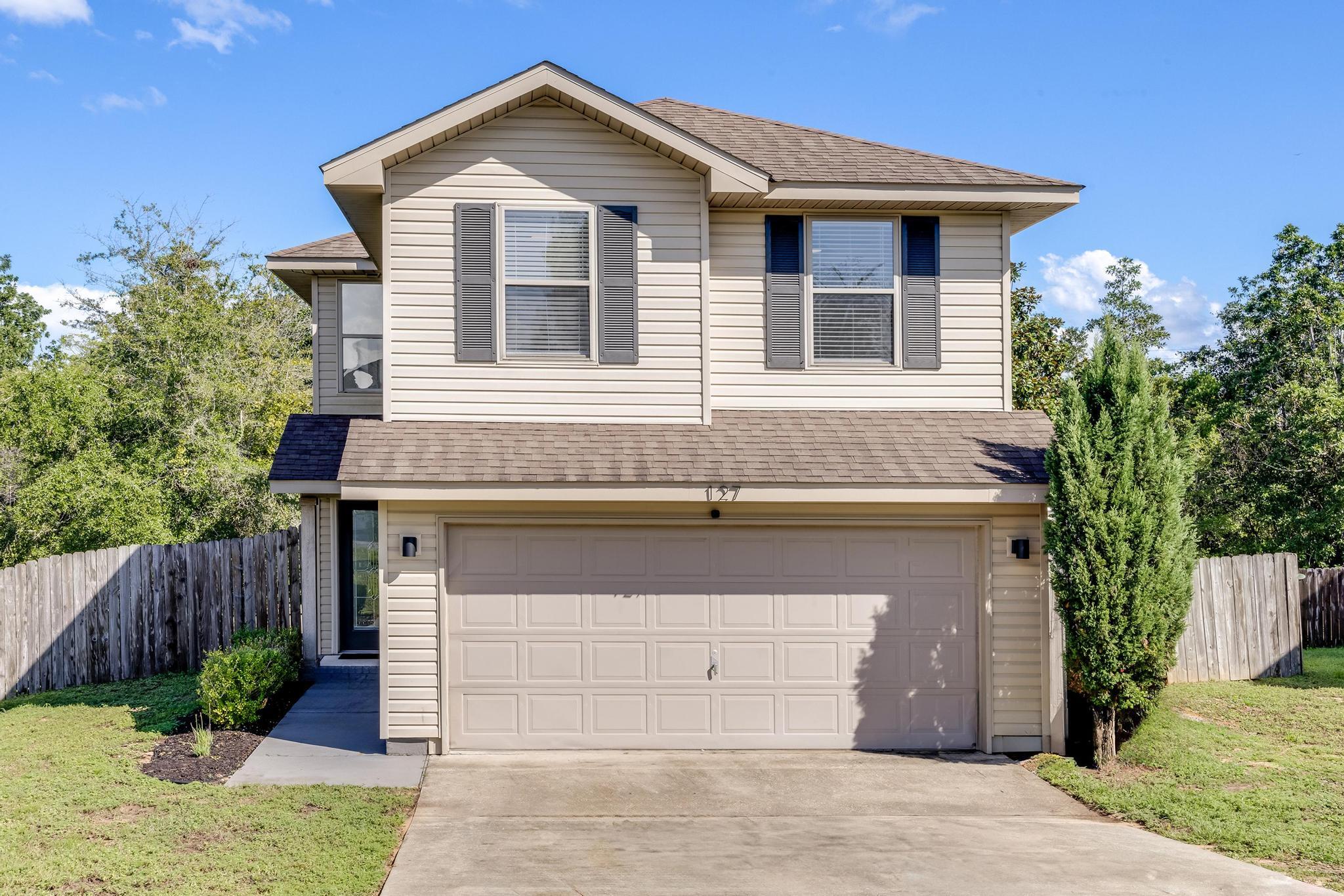 The perfect home located in the quiet Iron Gate subdivision located just one mile from Publix, Walmart and Riverside elementary. As you walk in you will immediately be impressed with the 22 foot ceilings and natural light. Recently updated with beautiful touches throughout. New appliances, lights, fans, faucets and more give this home a modern feel. Two large sheds in the back yard give you plenty of space for tools or anything you choose. Large side yard allows for parking of boats or RVs so bring your toys. Priced to sell!