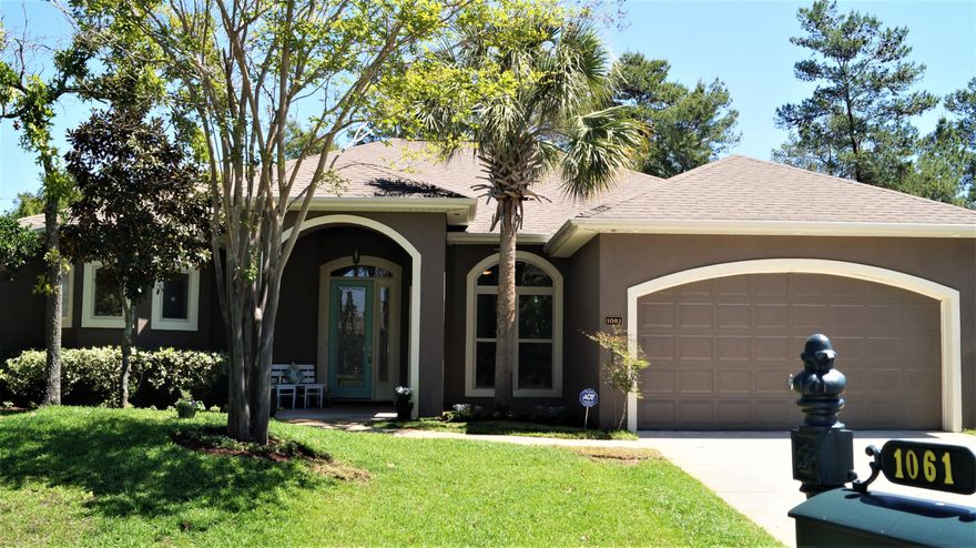 This beautiful home has a spacious feel with its high ceilings and 8 ft doors throughout, adding to its elegance the trey ceilings in the living and master suit. Your living space is expanded to the screened lanai that wraps around the rear of the home and is accessible via 3 sets of beautiful french doors. The private office with 1/2 bath would be perfect for a home business,or could serve as a 4th bedroom, den or game room. Relax in the master suite with its huge dual shower,jetted tub, and large walk in closet that can be customized to suit your needs. The split floor plan offers two additional bedrooms separated by a 2nd full bath.The open floor plan is perfect for entertaining large group which can flow through the two living areas along with the outdoor space