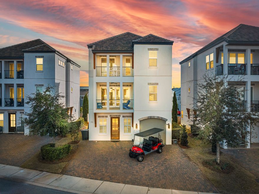 95 Wadleigh Way is a modern luxury coastal home located in the highly desirable Retreat at Miramar community, just a short walk or quick golf cart ride to Miramar Beach's largest public beach access. Projected annual rental income is $170,000-$180,000, and the property conveys fully furnished and professionally decorated, including a brand new 6-seat street-legal golf cart. Designed to accommodate large groups while maintaining an upscale feel, the home offers 6 bedrooms, 5.5 bathrooms, and sleeping accommodations for up to 17 guests, making it an ideal primary residence, second home, or income-producing investment.The interior features an open-concept great room with high-end finishes, generous living space, and a gourmet chef's kitchen well suited for entertaining. Multiple balconies provide inviting outdoor living areas overlooking the community clubhouse and resort-style pool. A dedicated second-floor game room with a pool table, custom wall-mounted arcade system, and large TV serves as a true entertainment hub and enhances overall livability and rental appeal. This level also includes a king suite and two custom bunk rooms, each with ensuite bathrooms. The third floor offers three spacious king suites, including one with private balcony access and a spa-style bathroom with dual vanities and a walk-in shower.

Positioned directly across from the community's 90-foot heated pool and clubhouse, the home enjoys immediate access to covered lounge areas, grilling pavilion, large TVs, restrooms, outdoor showers, walking paths, and a scenic catch-and-release fishing pond. With a proven layout, premium amenities, and a prime Miramar Beach location within an established short-term rental community, this property offers an exceptional blend of lifestyle enjoyment and strong investment potential.