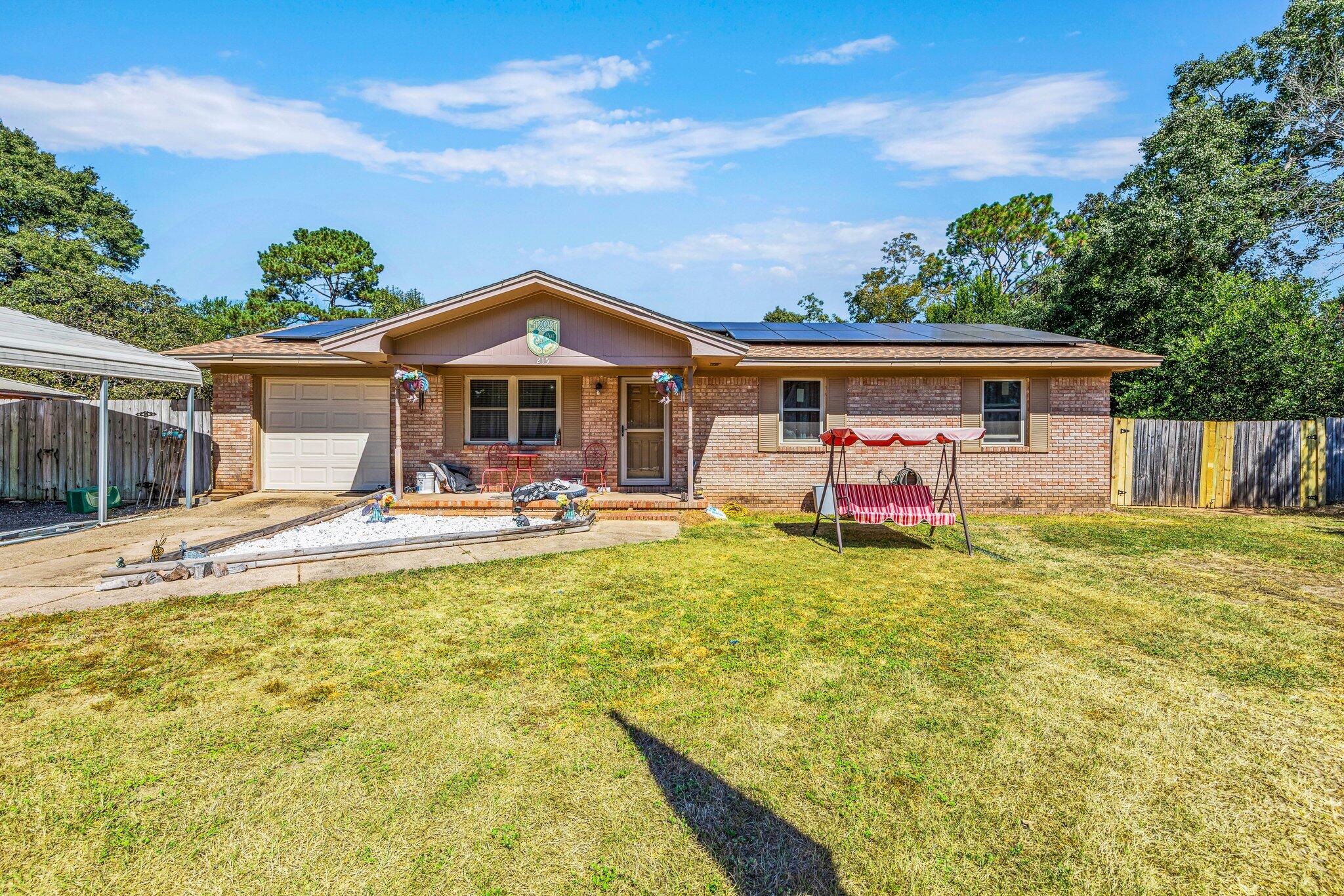 Nice all brick, quaint home. Perfect starter home in established neighborhood located central Crestview. Conveniently close to shopping and local eateries. Home has been updated and is energy efficient. Brand new roof less than 1 yr. old. Kitchen updated in 2017. Thermal windows are 3yrs. old with lifetime warranty. Solar panels are paid off, giving an extremely low utility bill. HVAC 1 yr. old. Garage door 2 yrs. old with insulated garage ceiling. Home also wired for 2 (30 amp) camper hookup that's only 3 years old. All new paint! Very Spacious backyard. Showings to begin Oct. 14. Please text L.A. (850)612-5441