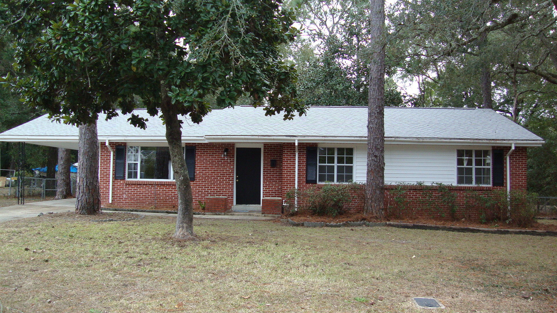 Perfect family home that's been newly renovated! Beautiful brand new dark wood laminate flooring in the family room, dining room and hallway. New 18 inch tile in the kitchen along with new beautiful counter tops, sink, stove, dishwasher and disposal. Freshly painted throughout, with a huge bonus room that could easily be converted into a large master suite...just add a bath in one of the two large walk-in closets! It could also be used as a forth bedroom for a family member. Completely renovated master bath! Brand new carpet in the bedrooms. Brand new lighting with six ceiling fans throughout the home. The roof is a 30 year three dimensional... and only a few years old! This amazing home is situated on a beautiful serene lot that backs to Eglin Air Force Base...on almost a half acre lot!