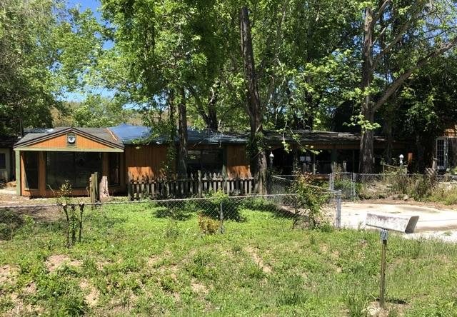 REO. Large home on a large corner lot in the heart of Fort Walton Beach. Close to shopping, dining, schools, both military bases & hospital. Property has two additional structures that both have kitchens & baths. This property is eligible under the Freddie Mac First Look Initiative THROUGH June 13, 2019.