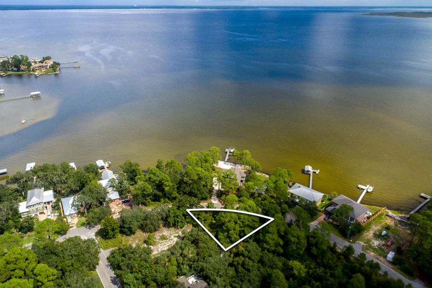Beautiful piece of land ready for you to build your dream home on! The land sits directly across the street from the Choctawhatchee Bay and is just minutes from Grand Boulevard, Sandestin, and Sacred Heart Hospital. In the heart of North Santa Rosa Beach, conveniently nestled between 30A and Miramar Beach.