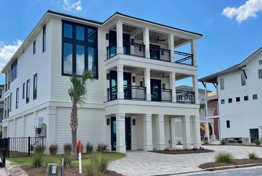 OPEN HOUSE 12-3pm, SUNDAY, May 18th, 2025. Come see this fabulous Sugar Sand Beach home in one of a kind Gated Coastal Community of only 64 homesites in Mexico Beach. A Coastal Community unique with its surroundings of protected Nature preserves & a secluded pristine private beach away from crowds. The Community Pool & Pool House are well designed for picturesque entertaining offering expansive indoor/outdoor space, Gourmet Kitchen & nicely equipped Gym. An impeccably furnished home w/ attractive curb appeal offering nice landscape with expansive parking in the beautiful finished Garage & large driveway. Take the Elevator: 2nd floor Living areas with 9' ceilings, Master Suite comfortably designed w/ luxurious Bathroom & Custom walk-in Closet, 4 Guest Bedrooms, 2 1/2 Bathrooms, Luxury Laundry room; 3rd floor Grand Living Room, elegant Kitchen with High end Gourmet Thermidor appliances & super Grand Island, an adjacent overflow Kitchen area with additional built in Storage, Crushed ice maker & Espresso/Coffee maker. Choose your view from one of 4 sizable Balconies all with composite Decking & Cypress ceilings - Back balconies offer some Gulf Views over acres of untouched Dunes - front Balconies offer views across the Preserved areas that surround the breathtaking Community. This home has never been rented but Gross Rental Income Projection was $125,000 to $150,000. 