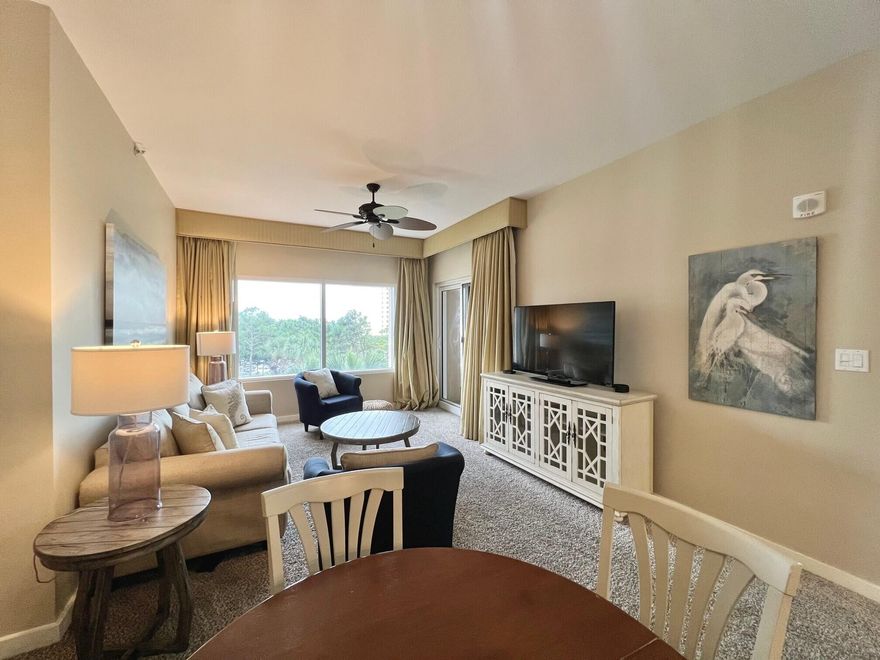 FULLY FURNISHED WITH ALL UTILITIES INCLUDED! This 2nd floor, 1-bedroom condo is easily accessible via the stairs or elevator and views of the Gulf of Mexico can be seen in the distance. Enjoy your coffee out on the private balcony while watching the sunrise over the Gulf. This spacious floor plan features a king bed and a sleeper sofa for overnight guests. You will love the ease and convenience of the proximity to the beach, putt putt golf, and the Beach House restaurant. Luau offers an on-site fitness center, sundeck, and an oasis getaway with a resort style pool, relaxing waterfall, hot tub, seasonal tiki hut, and grilling area. This beautiful condo is available for a 6-month lease beginning late October, come relax and enjoy the luxurious resort lifestyle!