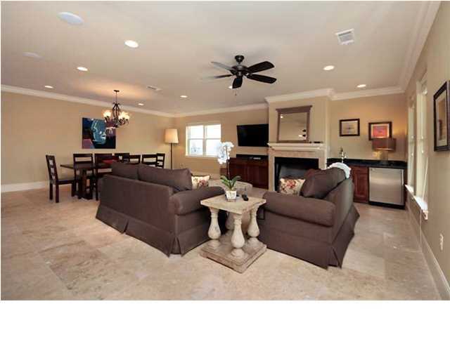CONSTRUCTION COMPLETE AND NOW BEING OFFERED FULLY FURNISHED! TURN KEY READY WITH OVER $90,000 IN FURNISHINGS AND ELECTRONICS!!! Fantastic opportunity with the possibility to cash flow with an estimated gross rental income of $120,000. NO HOA Fees, Sleeps 24, Gulf Views and Short Stroll to the beach. The 3 Story Beach Retreat will have over 700 square feet of balconies, an ELEVATOR, and a HEATED POOL. The first floor features an open floor plan with a living room, kitchen and dining area large enough for the number of guests the home can accommodate. You will also find a bedroom on the first floor. The second floor will have 5 bedrooms. The third level hosts the expansive Master Bedroom along with the 8th and 9th bedroom. Laundry Rooms on the 2nd AND 3rd Floors, Travertine Tile on Main